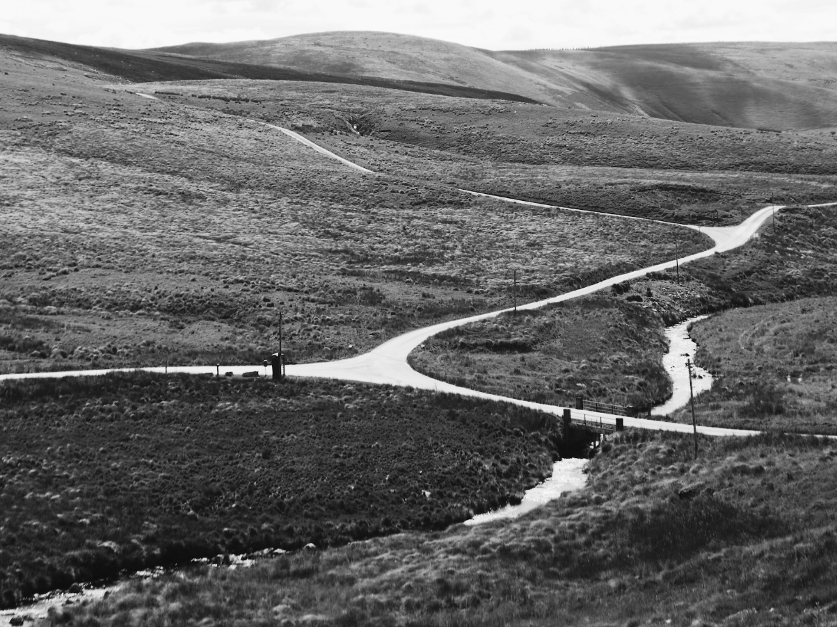 Photograph of paths through hills